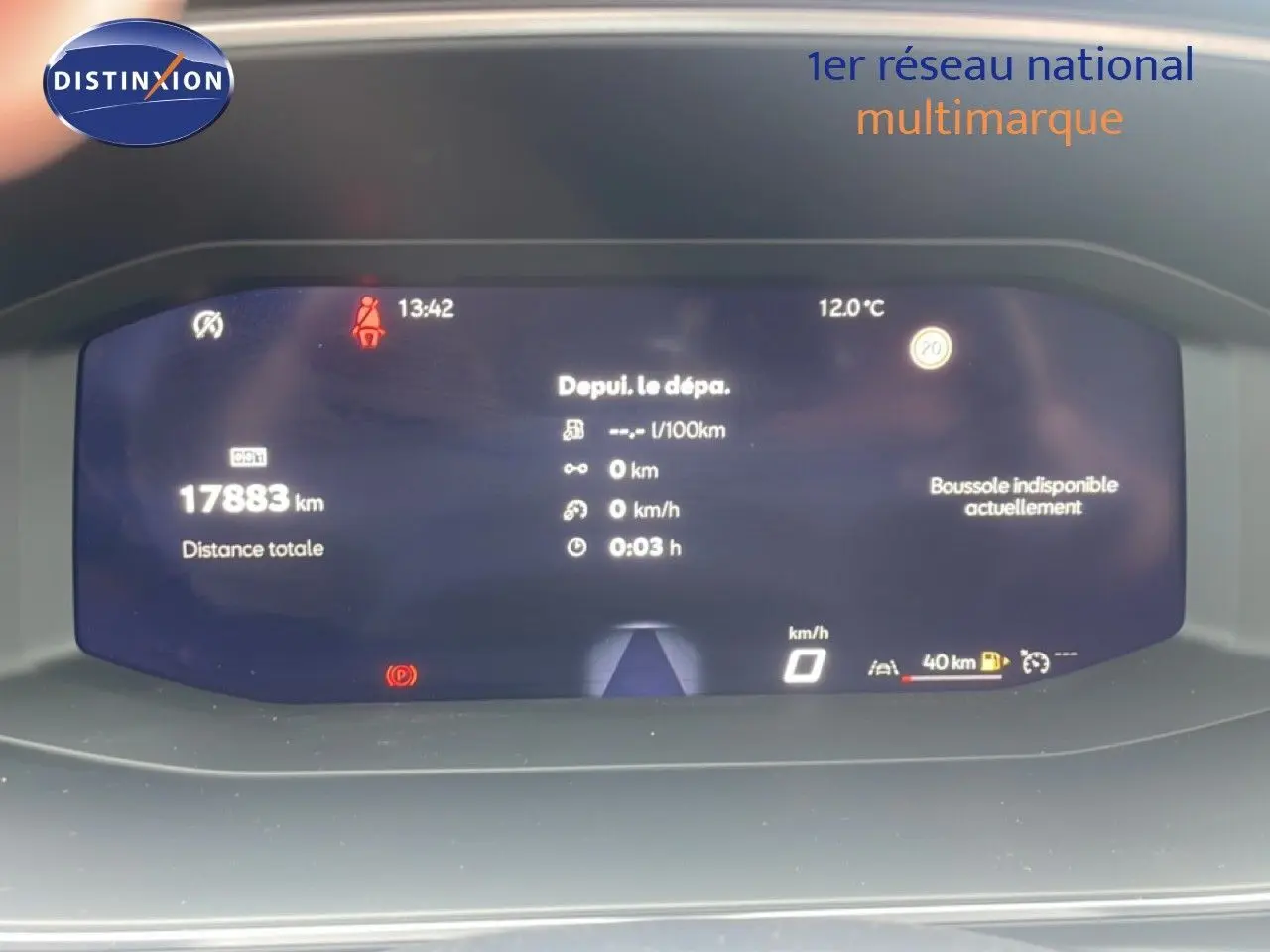 Tableau de bord numérique du SEAT LEON 2.0 TDI 115CH STYLE XL affichant 17 883 km et informations de conduite.