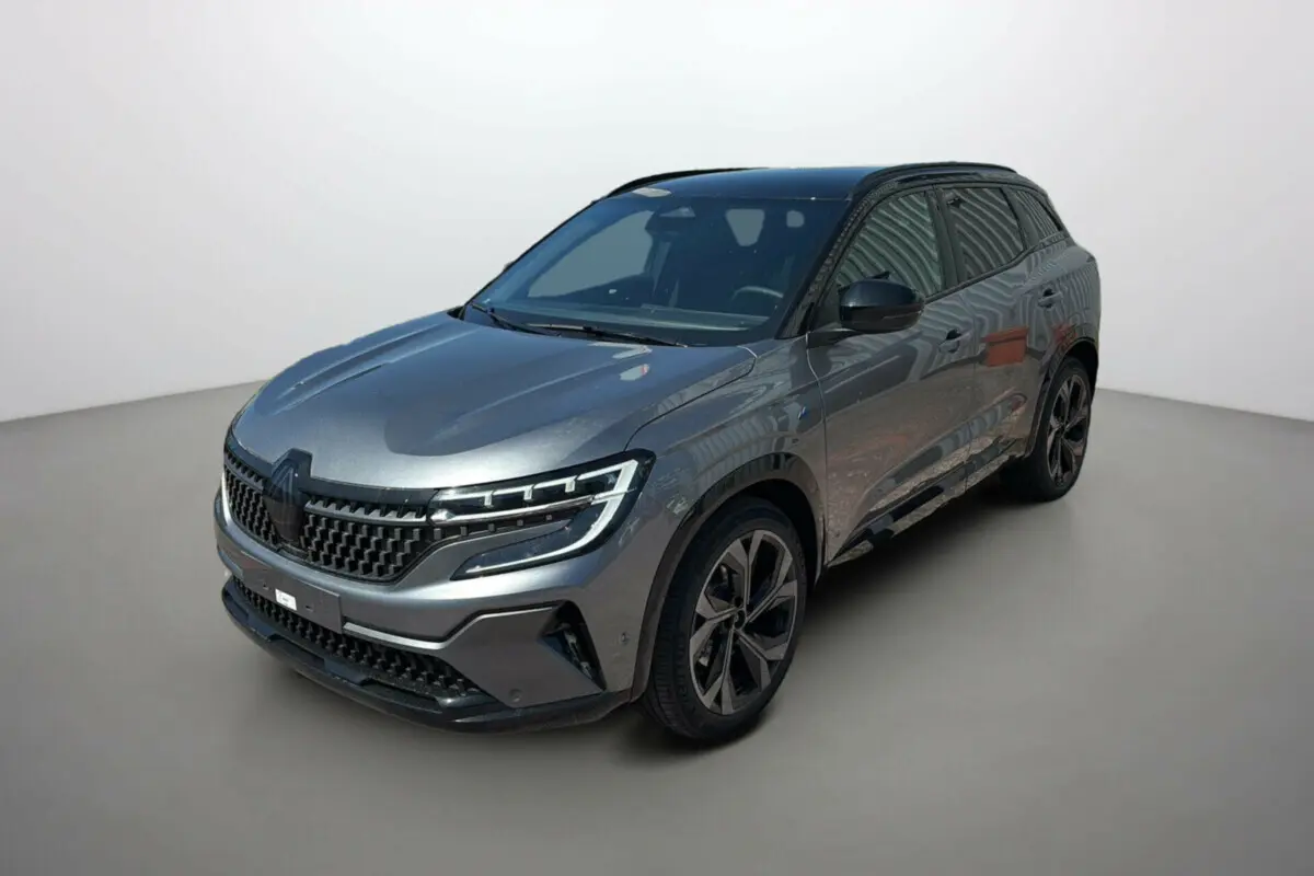 Renault Austral E-Tech 200 Esprit Alpine gris schiste avec toit noir, vue 3/4 avant droit, jantes alu 20 pouces.