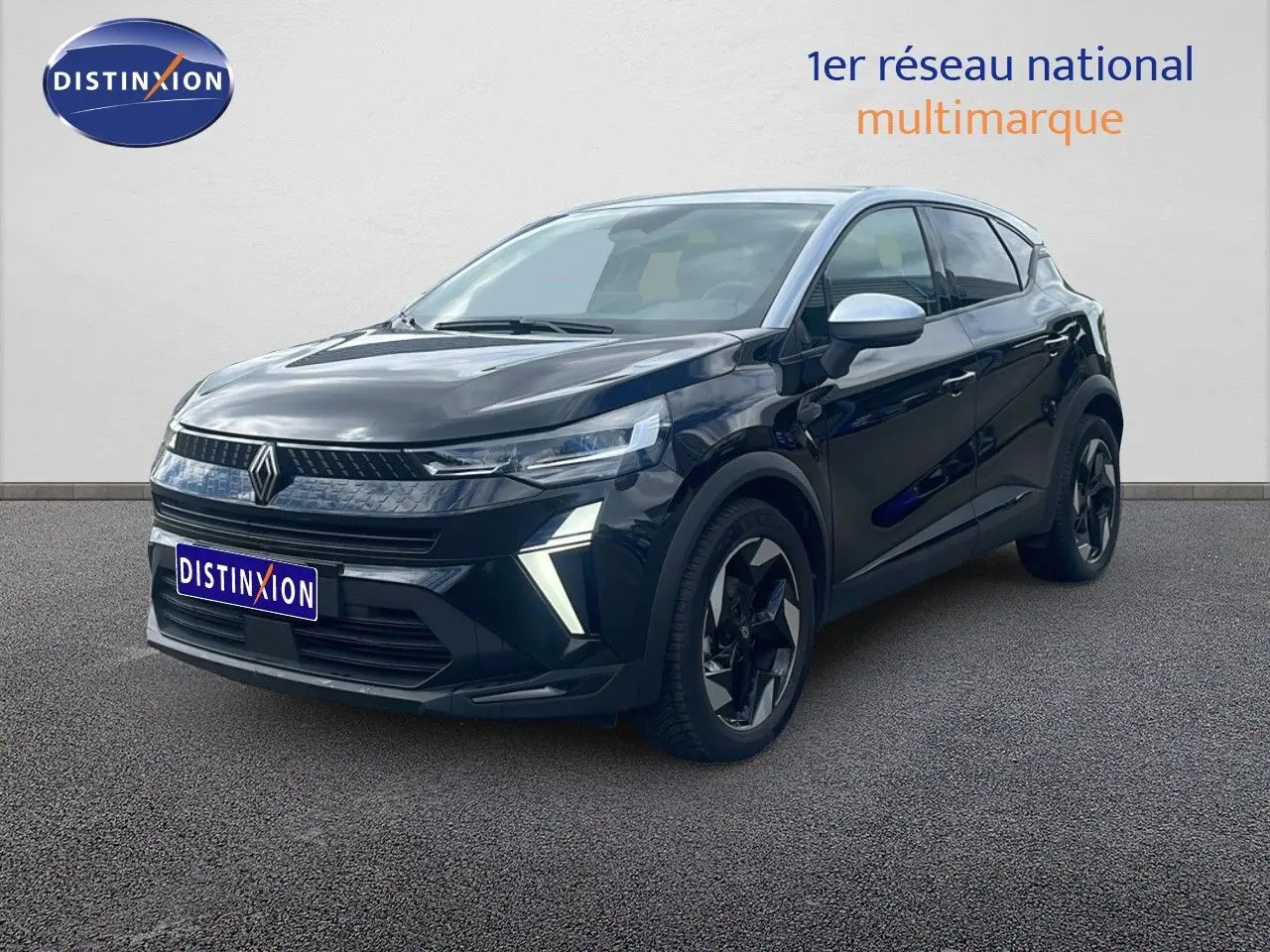 Renault Captur 2025 noir étoile métal vue 3/4 avant avec toit gris et feux LED distinctifs.