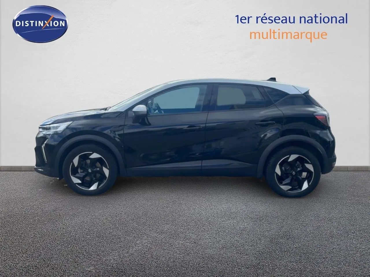 Profil gauche d'un Renault Captur 2025 noir étoile métal avec toit gris, jantes biton et lignes modernes.