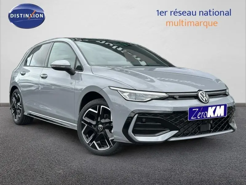 Volkswagen Golf 2.0 TDI R-Line gris vue 3/4 avant avec jantes noires distinctives et calandre sportive.