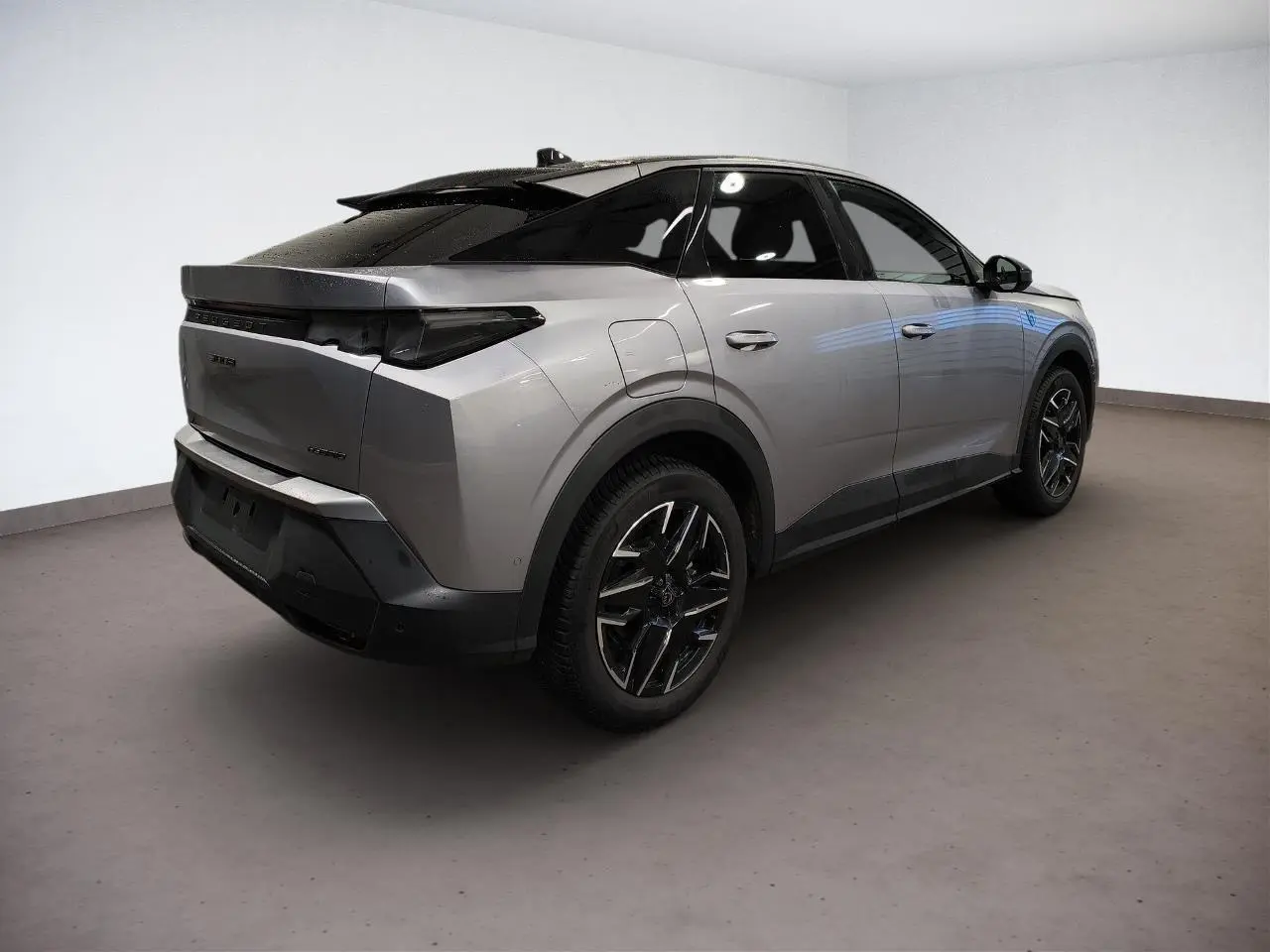 Peugeot 3008 Hybrid gris Artense vue 3/4 arrière droit avec toit noir et jantes alliage noires.