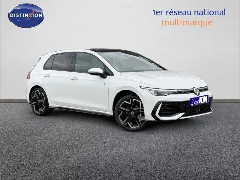 Volkswagen Golf 2.0 TDI R-Line blanc Oryx nacré vue 3/4 avant avec jantes noires distinctives.