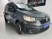 Renault Express Van gris en 3/4 avant droit, avec porte latérale coulissante et enjoliveurs noirs visibles.