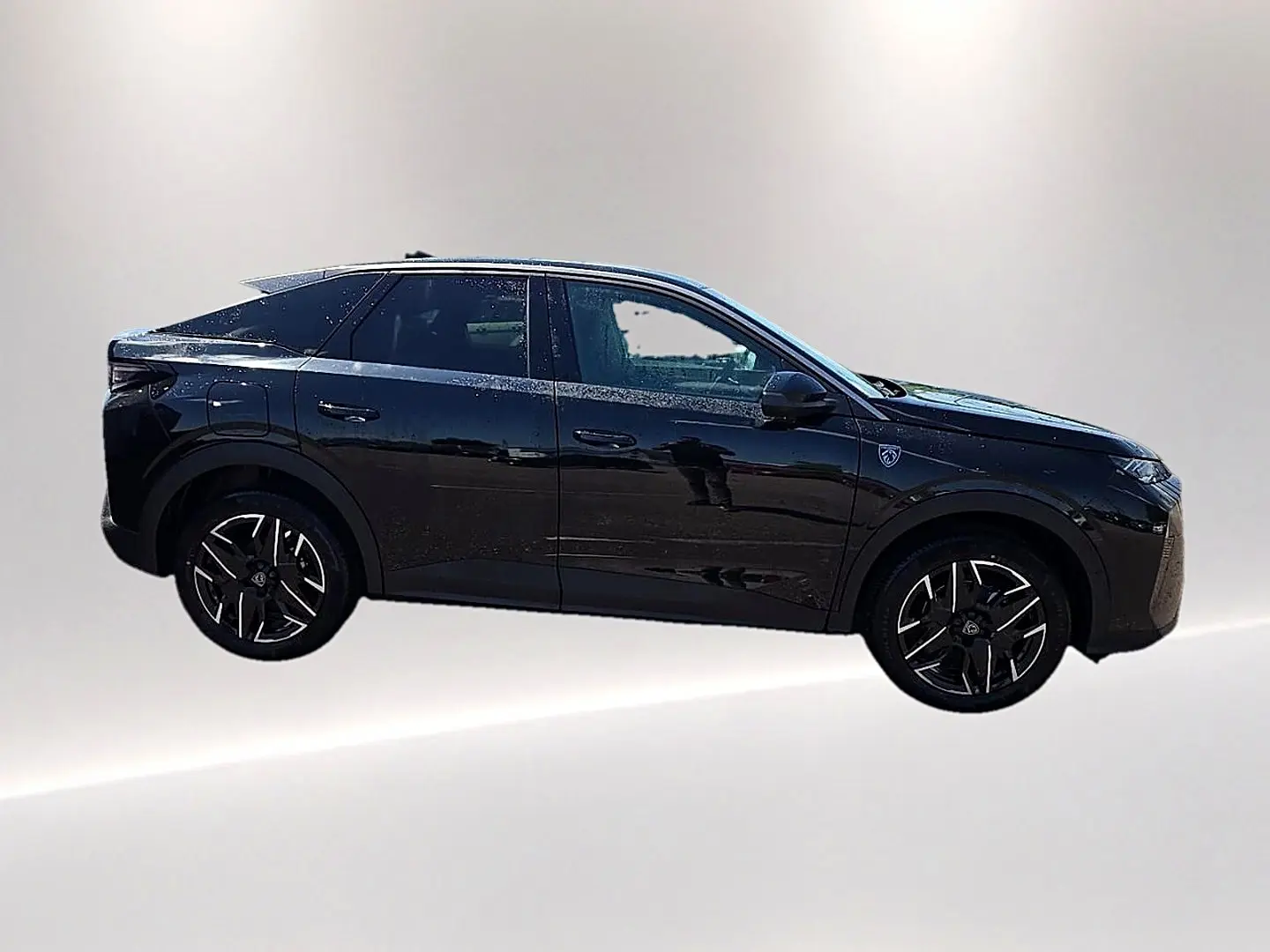 Peugeot 3008 noir en profil droit, mettant en valeur ses jantes alliage et lignes dynamiques.