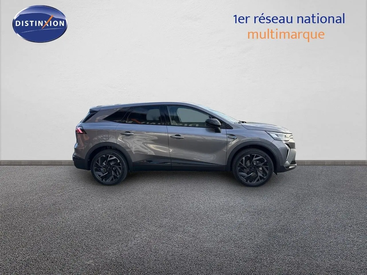 Profil droit du Renault Symbioz gris cassiopée métal 2024 avec jantes noires et lignes modernes.