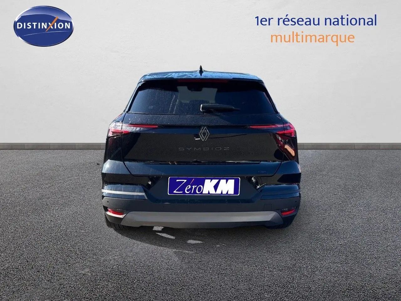 Vue arrière du Renault Symbioz noir étoile métal 2025 avec feux LED et logo central visible.