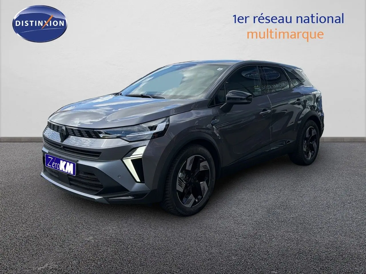 Renault Symbioz gris cassiopée métal, vue 3/4 avant droit, SUV hybride avec feux LED et jantes noires distinctives.