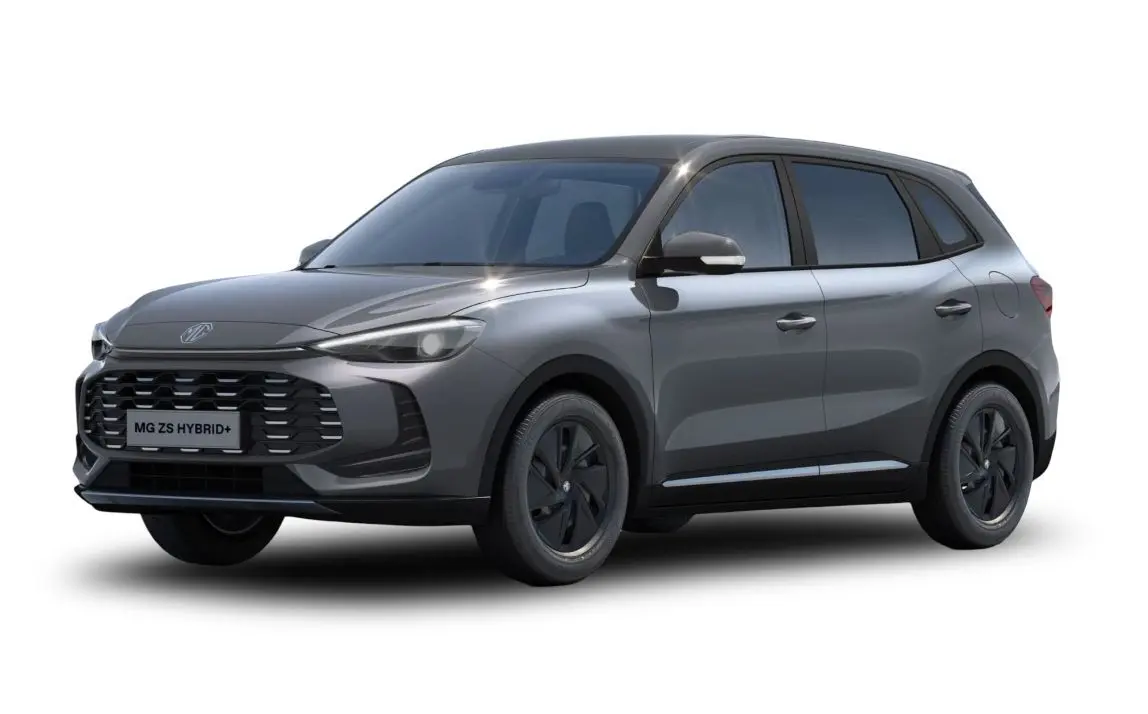 Vue 3/4 avant du SUV MG ZS 1.5L Hybrid+ 2025 en gris Hampstead, avec calandre noire et jantes foncées.