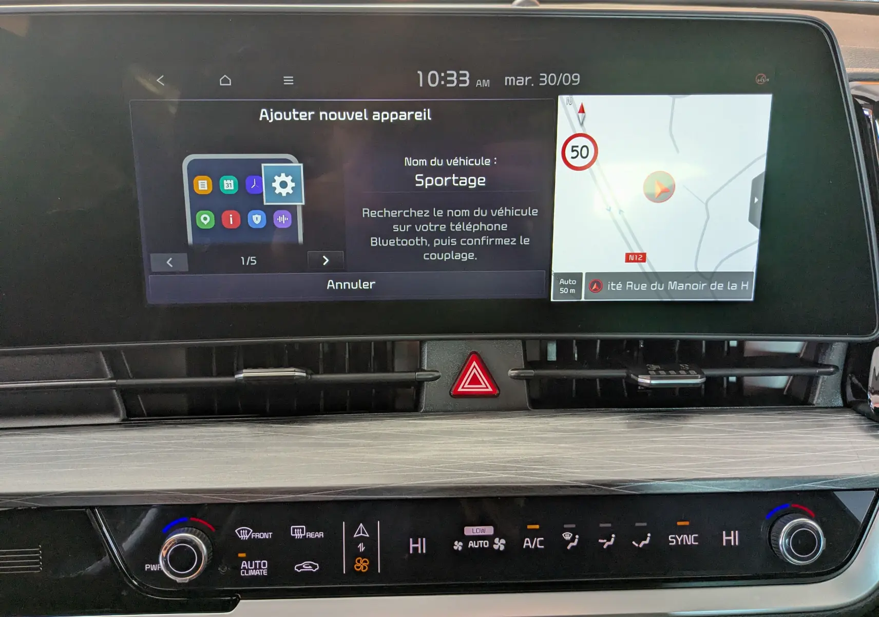 Écran tactile 12,3’’ du Kia Sportage MY25 gris eclipse montrant navigation, climatisation automatique bizone et commandes digitales.
