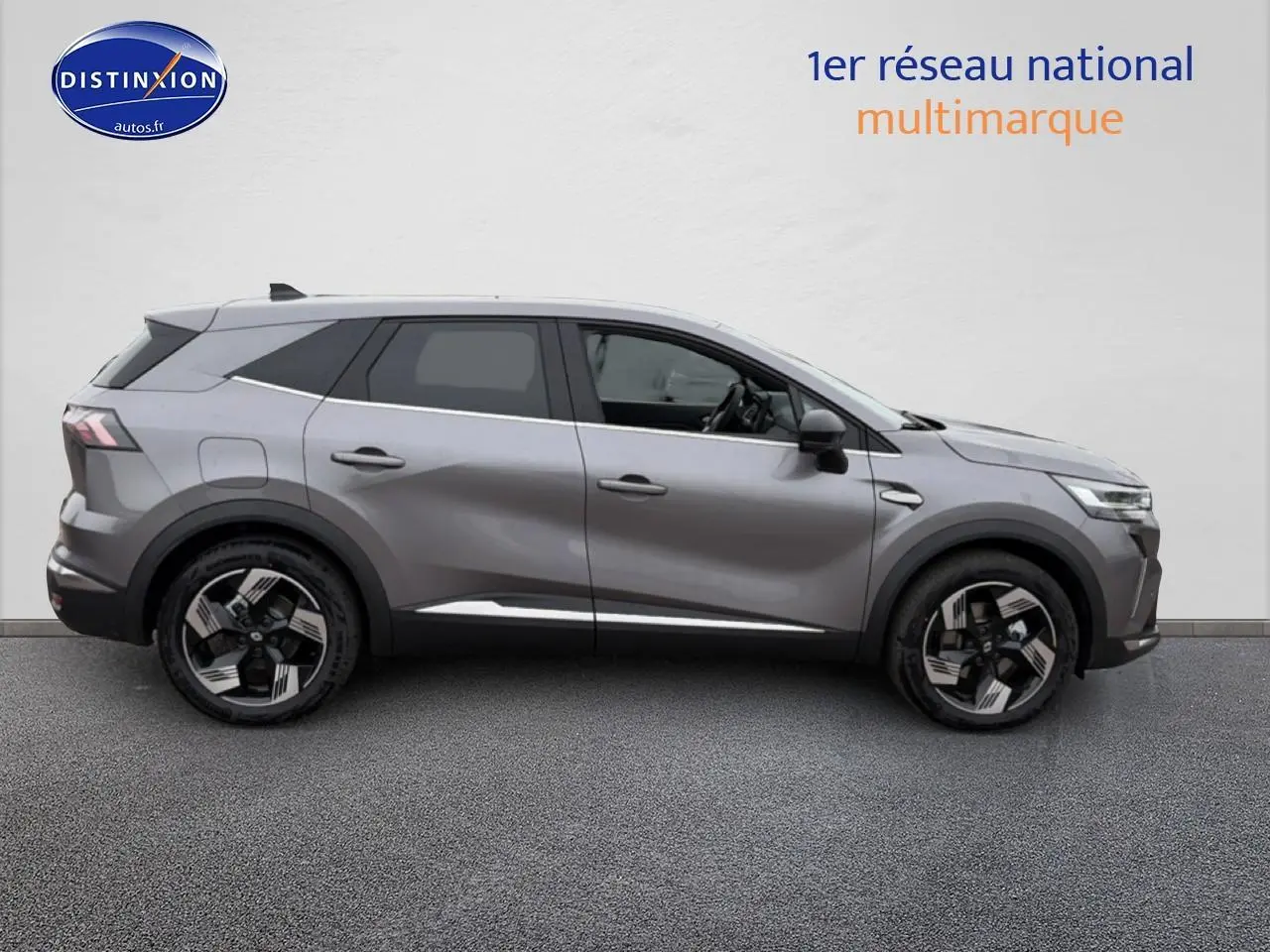 Profil droit du Renault Symbioz gris schiste 2026 avec jantes alliage 18 pouces et lignes sculptées modernes.