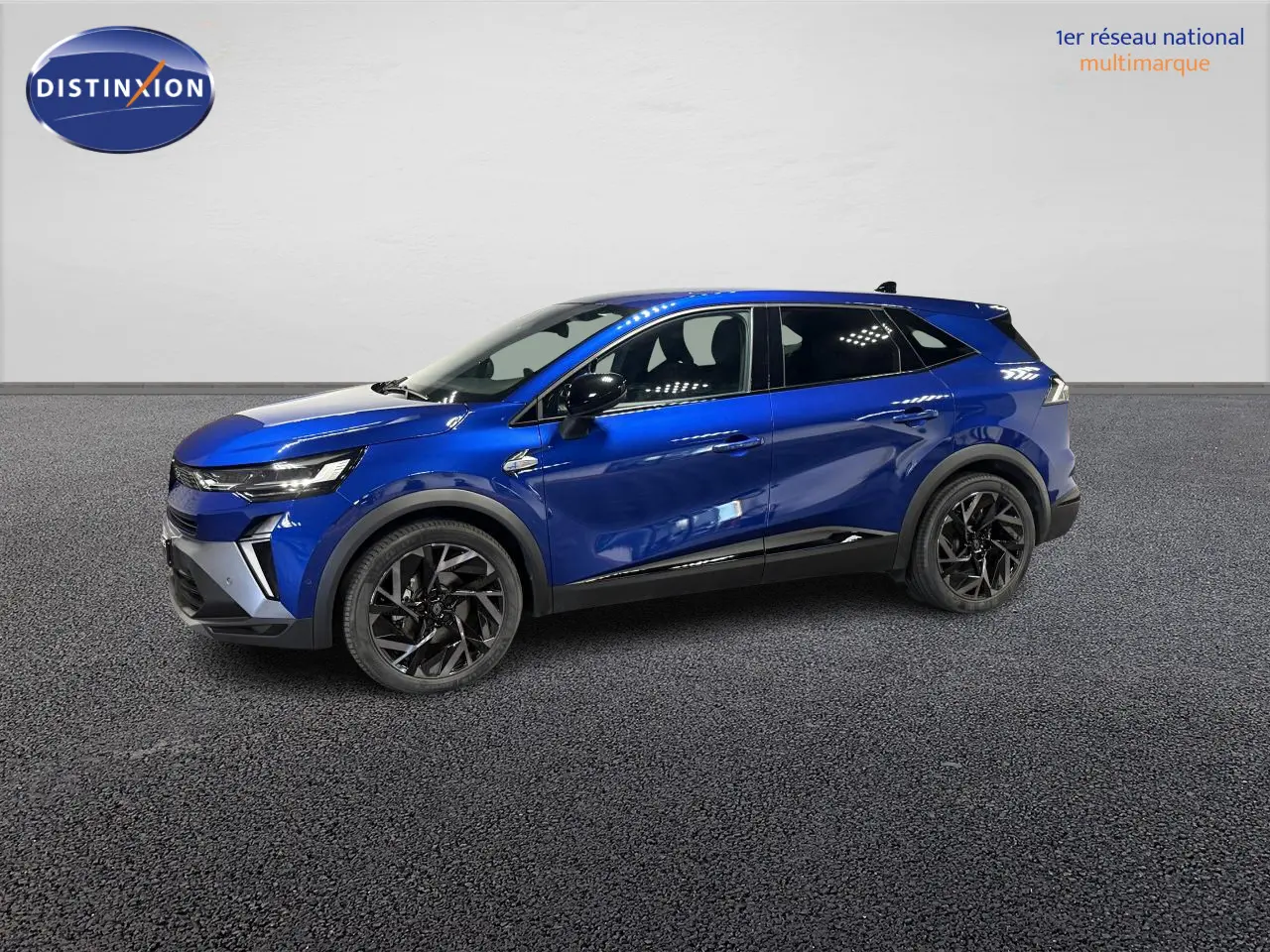 Renault Symbioz bleu Iron vue de profil côté gauche, avec jantes noires et détails noirs brillants.