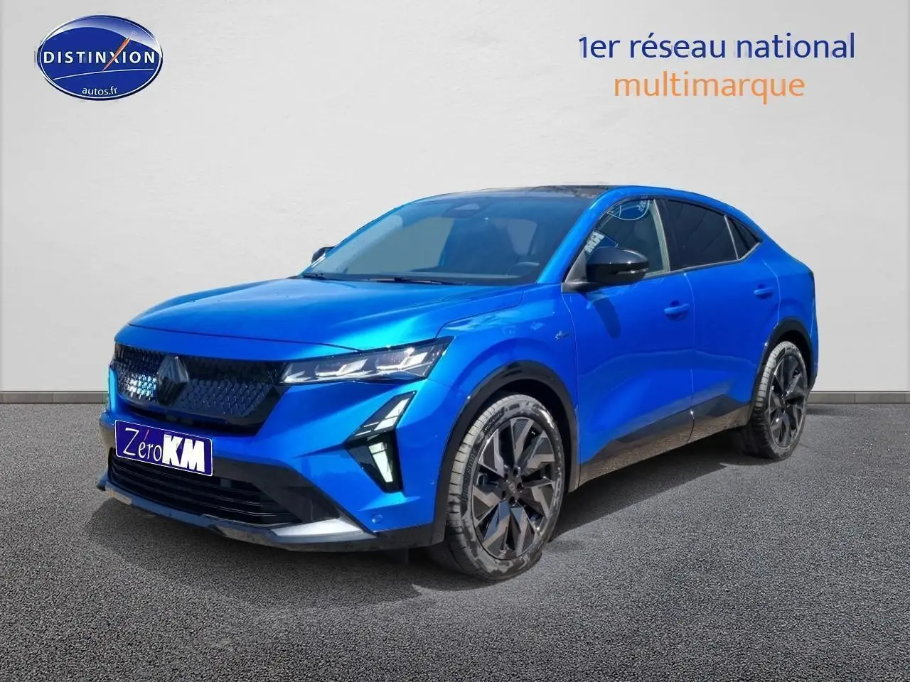 Renault Rafale bleu sommet en 3/4 avant droit avec jantes noires et toit panoramique noir brillant
