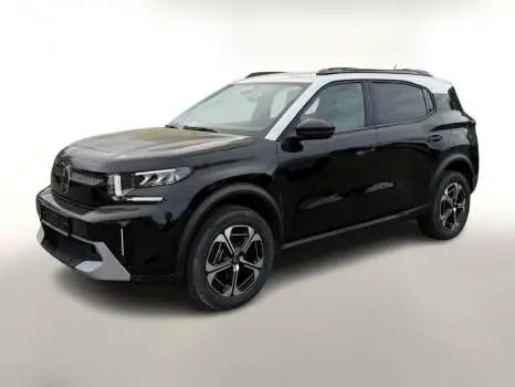 SUV Citroën C3 Aircross noir perla avec toit blanc, vu en 3/4 avant droit sur fond clair, jantes bi-ton visibles.