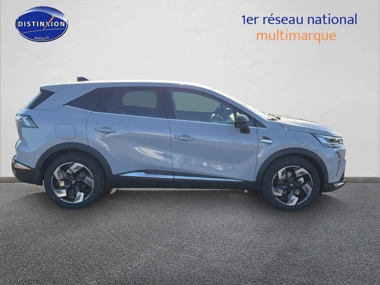 Profil droit du Renault Symbioz gris rafale 2026 avec jantes alliage et rétroviseurs noirs grainés.