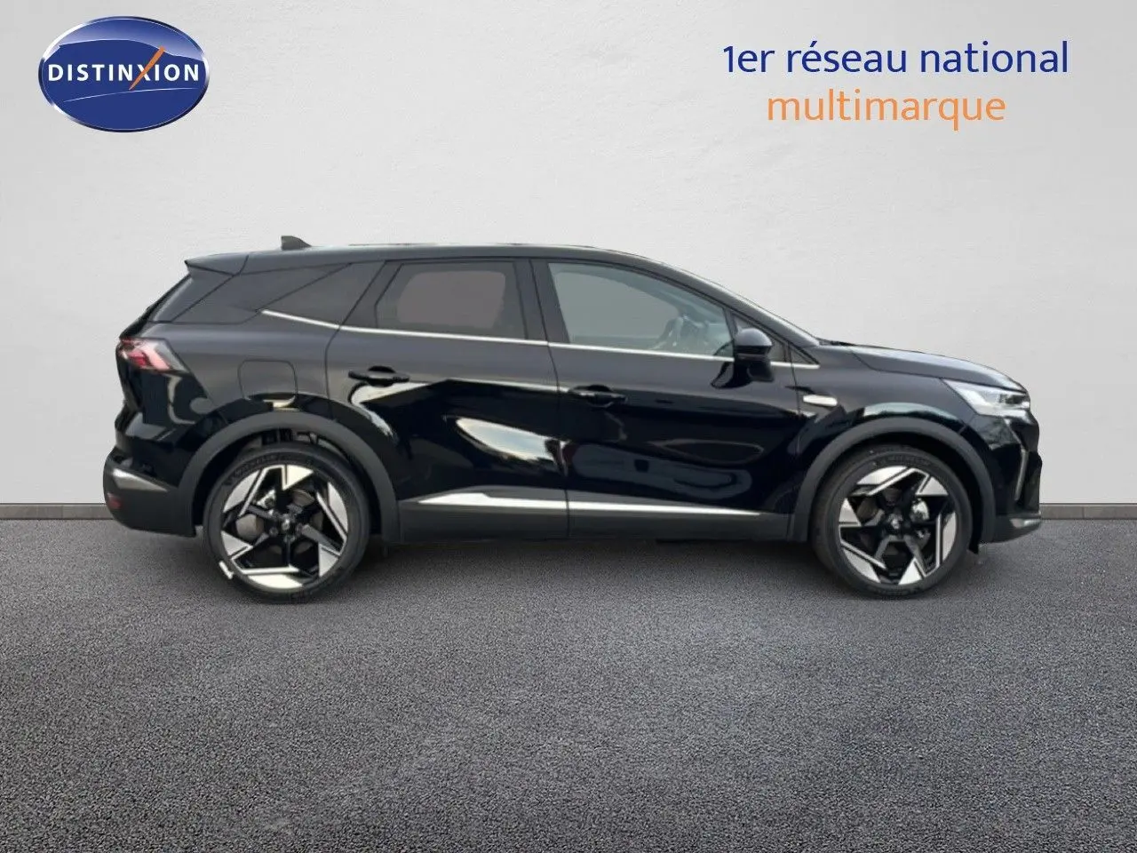 Profil droit d'un Renault Symbioz noir étoile métal 2025 avec jantes distinctives et lignes modernes.