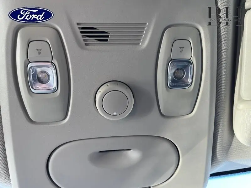 Plafonnier gris clair avec deux liseuses et une molette de réglage dans un Renault Scenic blanc nacré 2017