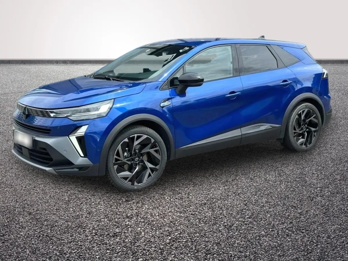 Renault Symbioz bleu en vue 3/4 avant droit, avec jantes noires et détails de calandre modernes.