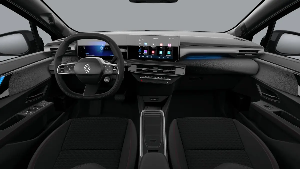 Vue intérieure avant de la Renault Clio Techno full hybrid 2026, tableau de bord noir avec écran tactile large et éclairage d'ambiance bleu.