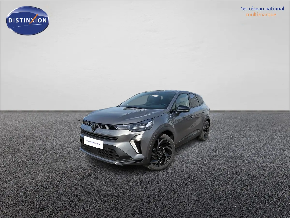 Renault Symbioz gris métallisé en 3/4 avant droit, avec jantes noires et signature lumineuse LED distinctive.