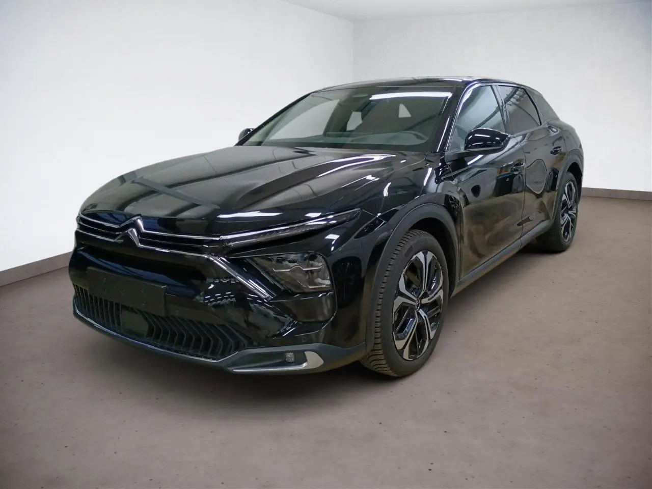 Citroën C5 X Noir Perla vue 3/4 avant droit, mettant en valeur ses phares LED et jantes alliage 19 pouces.