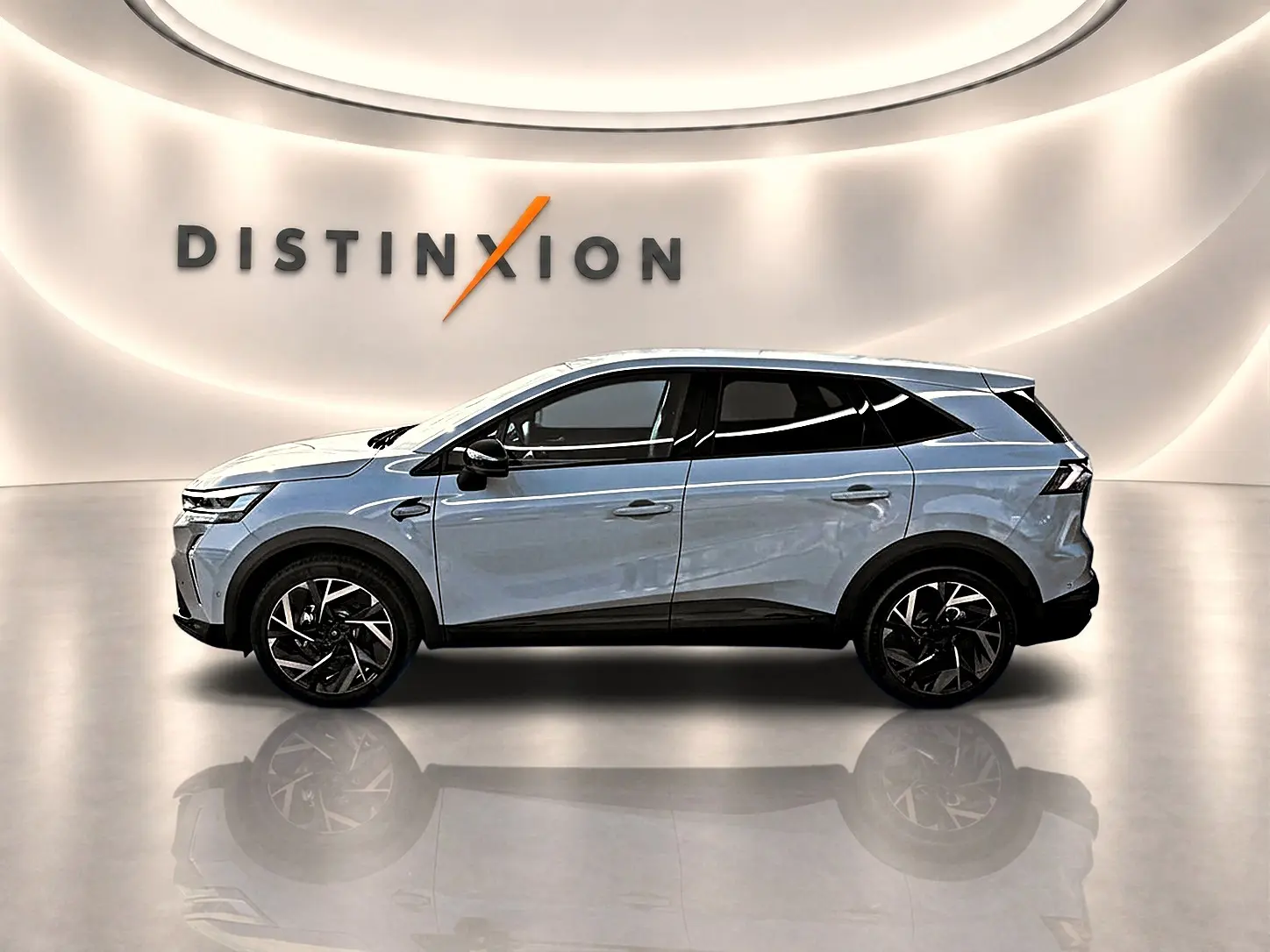Profil droit du Renault Symbioz gris rafale 2026, SUV hybride avec jantes alu noires et toit blanc.