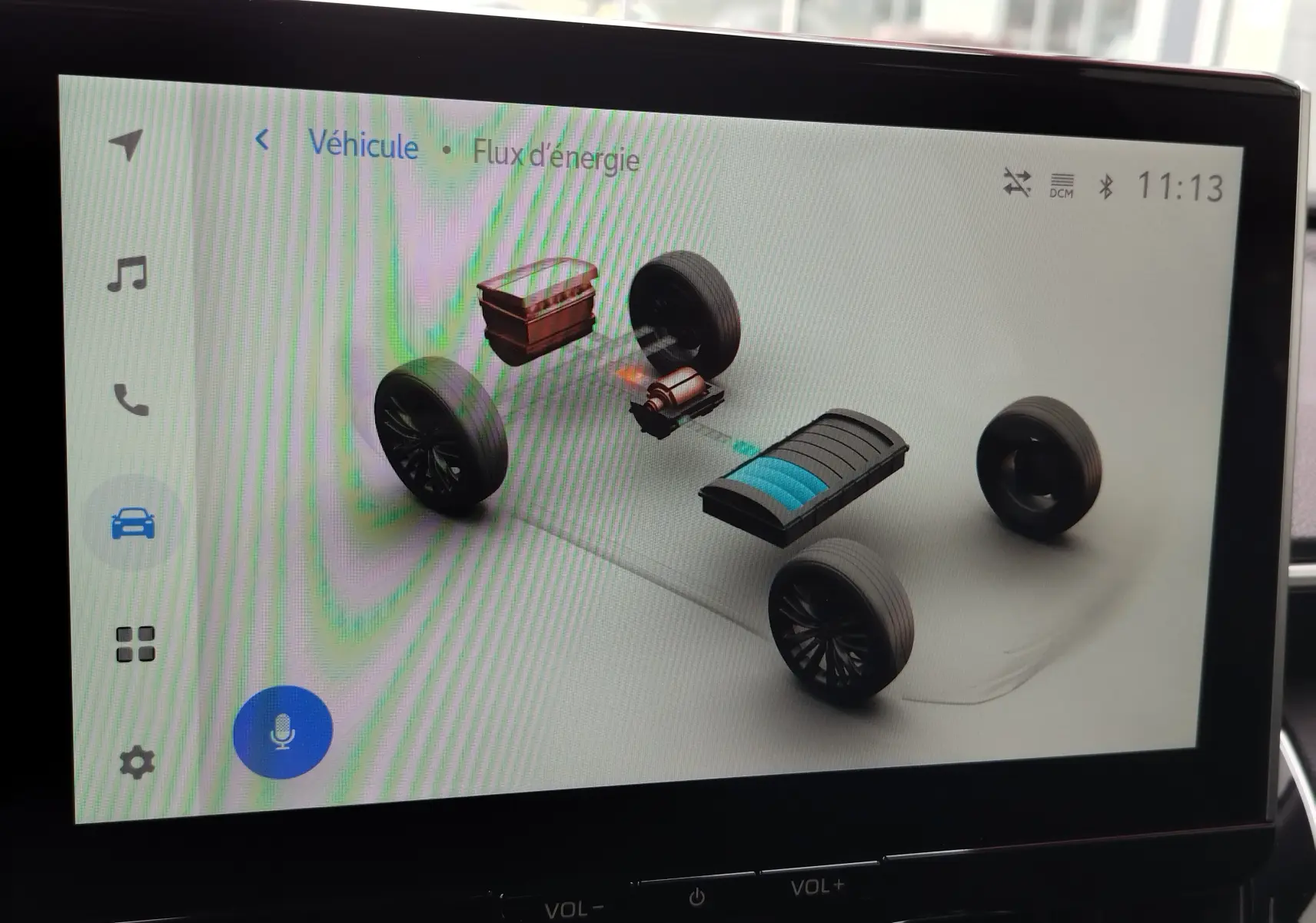 Écran intérieur montrant le flux d’énergie hybride du Toyota Corolla Cross 1.8l 140h Dynamic, interface moderne et épurée.