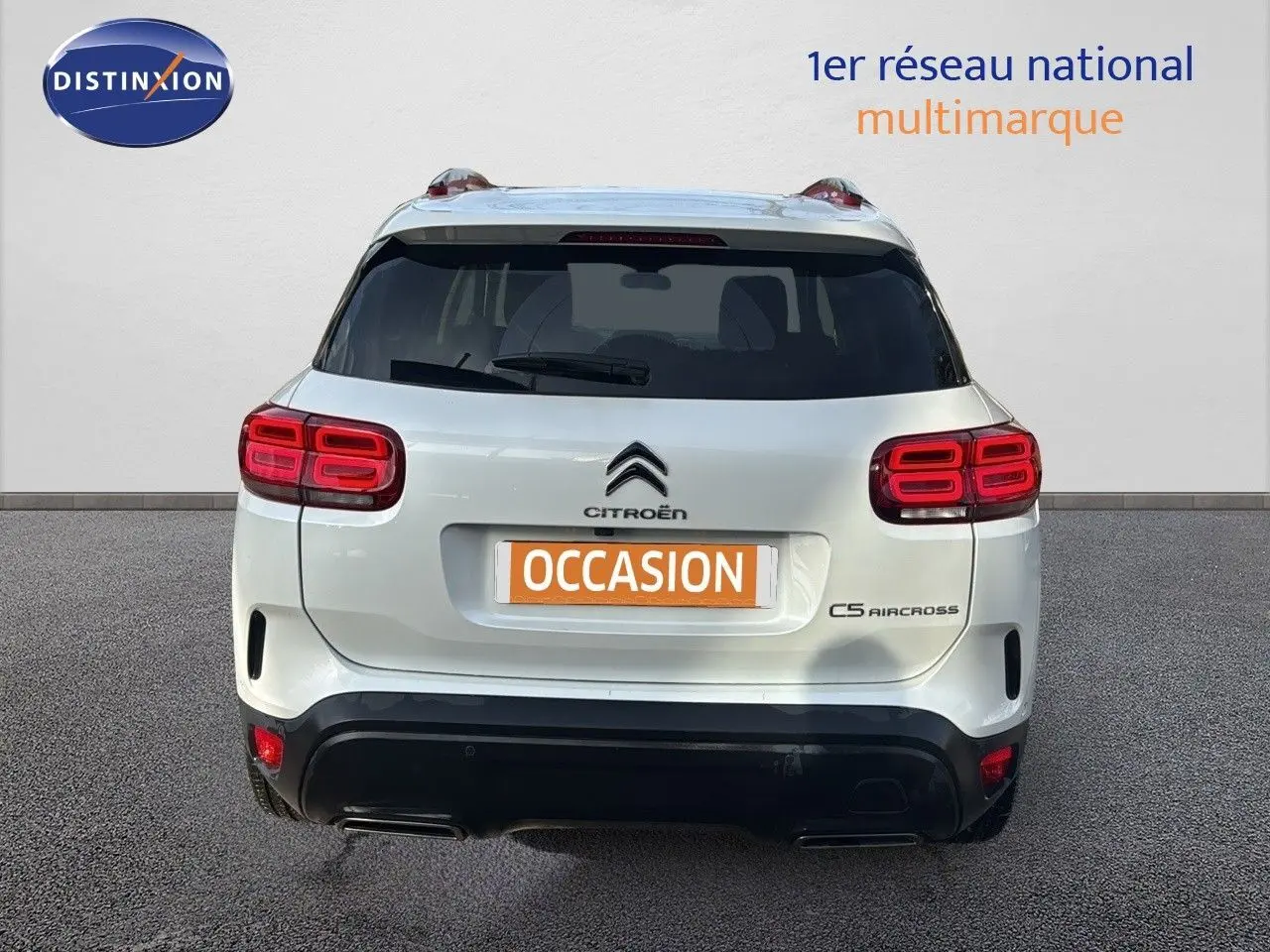 Vue arrière du Citroën C5 Aircross blanc nacré avec feux LED distinctifs et plaque "OCCASION" visible.