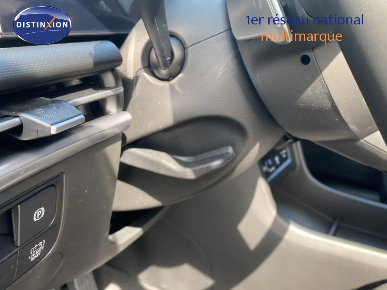 Détail intérieur côté gauche du tableau de bord et commandes du Hyundai Tucson gris Ecotronic 2026.