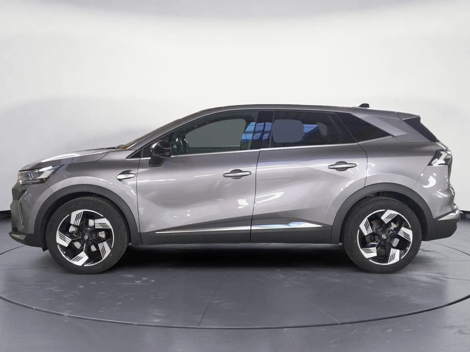 Profil droit du Renault Symbioz gris Casiopee, avec jantes alliage 18'' diamantées et vitres surteintées.