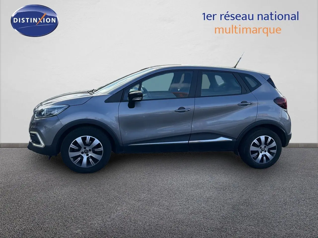 Renault Captur Zen gris cassiopée en profil côté gauche, avec jantes alliage et lignes de carrosserie fluides.