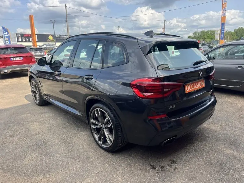 BMW X3 M40iA 2019 en Sophistograu métallisé, vue 3/4 arrière droit avec jantes 21 pouces style 726 rayons en V.