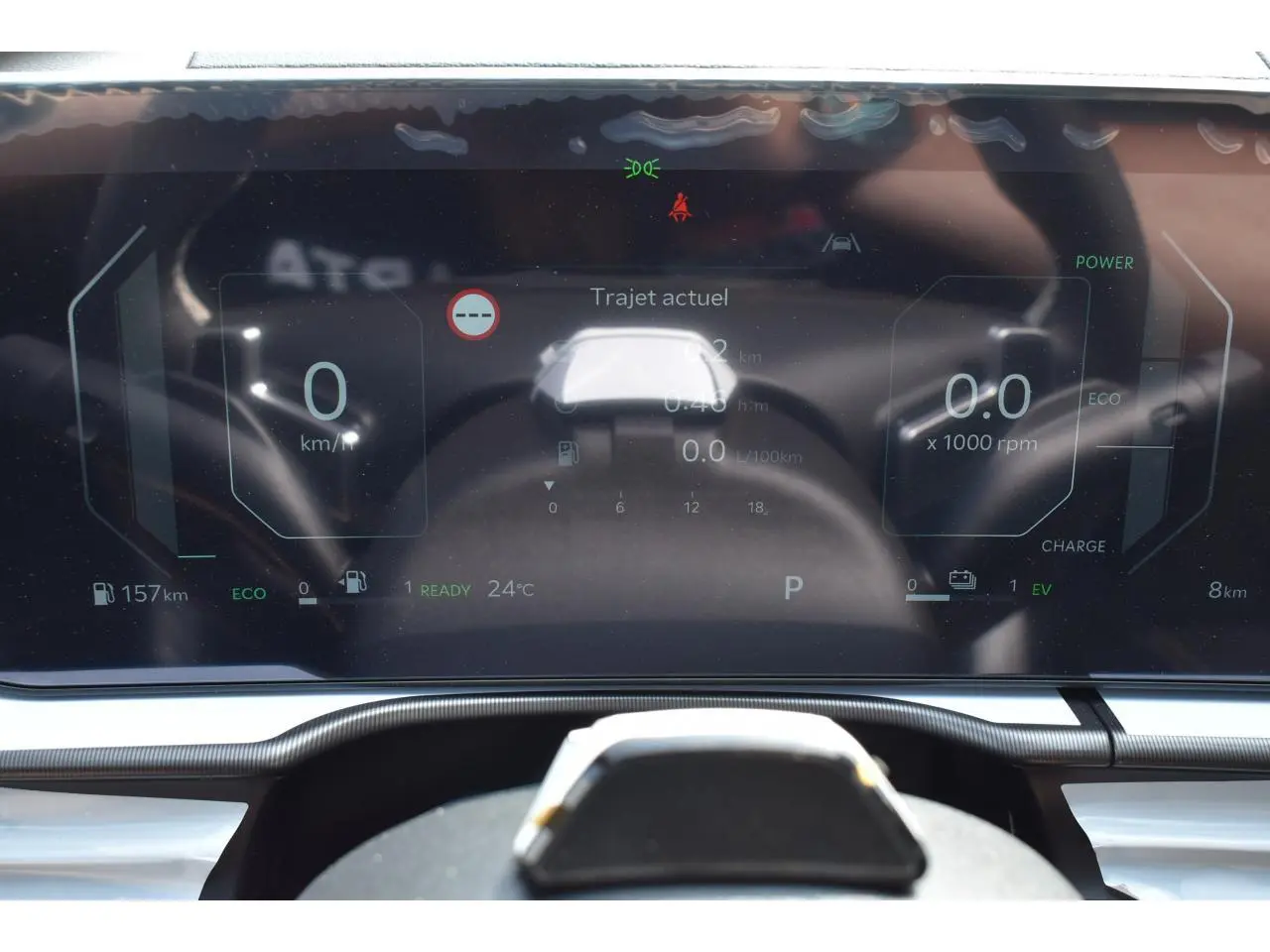 Combiné d'instrumentation digital 12,3'' du Kia Sportage hybride 2026, affichage vitesse et mode éco visible.