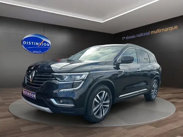 Renault Koleos noir 2017 en 3/4 avant droit, SUV élégant avec phares LED et jantes alliage 18 pouces visibles.