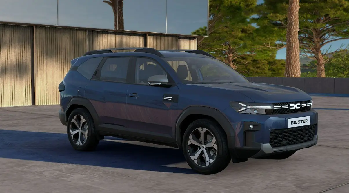 Dacia Bigster bleu indigo en 3/4 avant droit, SUV avec calandre lumineuse et jantes bi-ton distinctives.