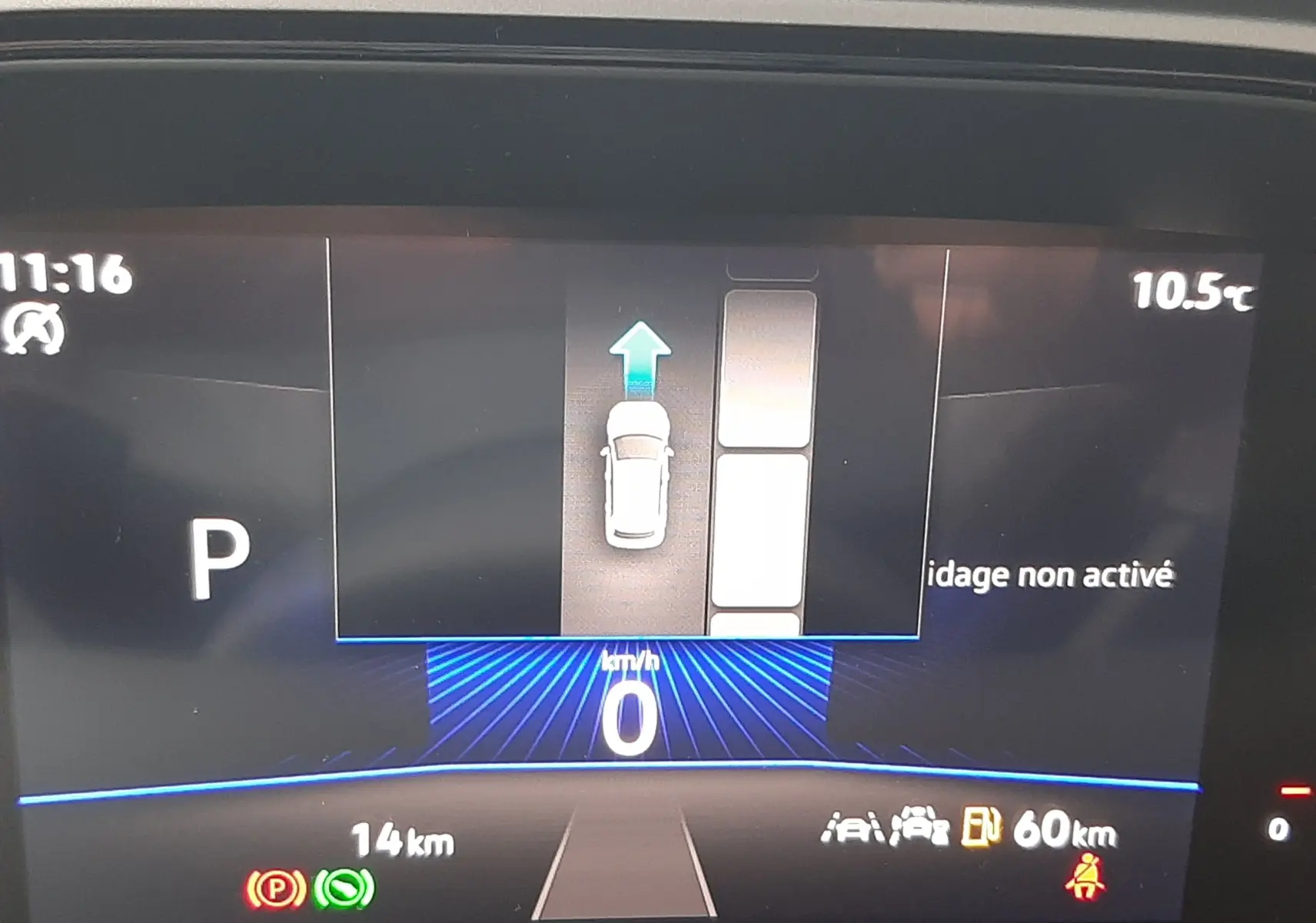 Affichage numérique du tableau de bord du Volkswagen T-Roc 1.5 TSI 2025 montrant la vitesse à 0 km/h et l'état du véhicule en mode parking.