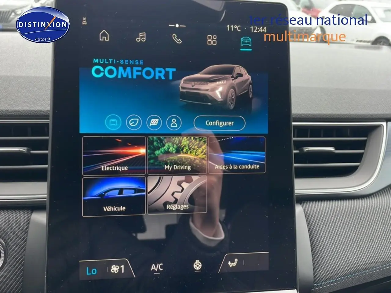 Écran tactile central du tableau de bord du Renault Captur 2025 affichant le mode de conduite Comfort.