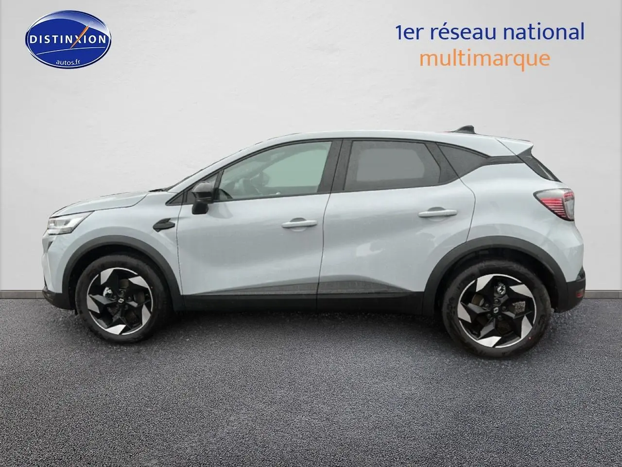 Renault Captur gris rafale vue de profil côté gauche avec jantes alliage et poignées ton carrosserie.