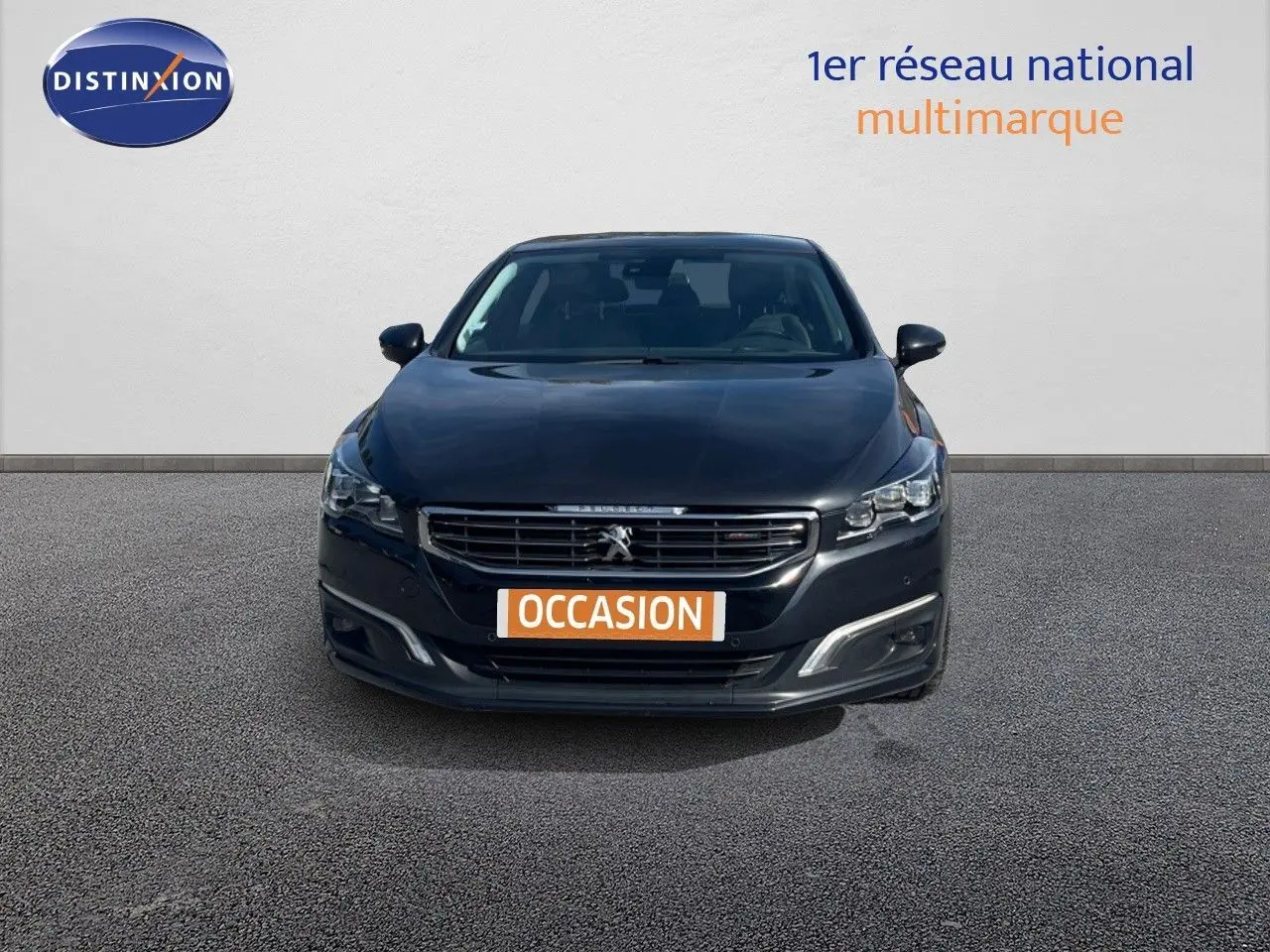Peugeot 508 GT Line noire vue de face, avec calandre distinctive et plaque "OCCASION" visible.