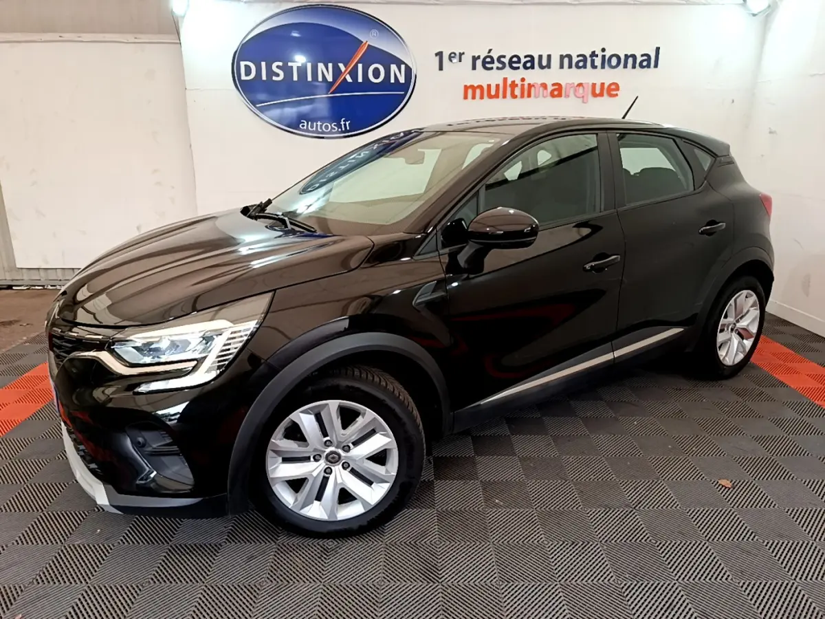 Renault Captur Business Blue dCi 95 noir en 3/4 avant droit, avec jantes alliage et feux LED visibles.