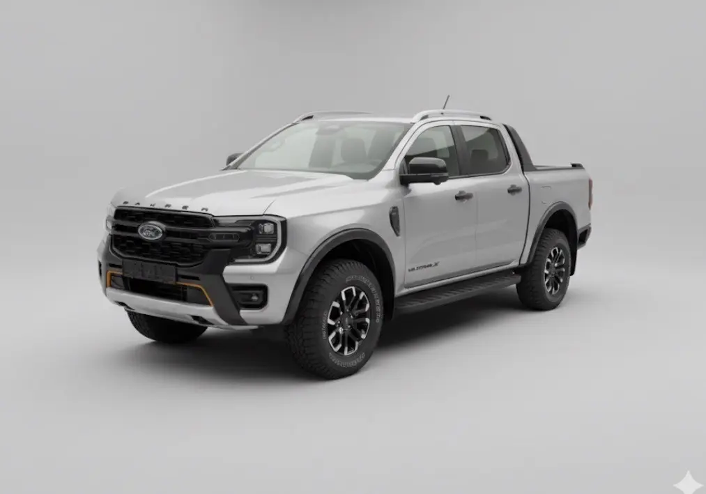 Ford Ranger Wildtrak gris en 3/4 avant droit, avec barres de toit et jantes alliage noires.