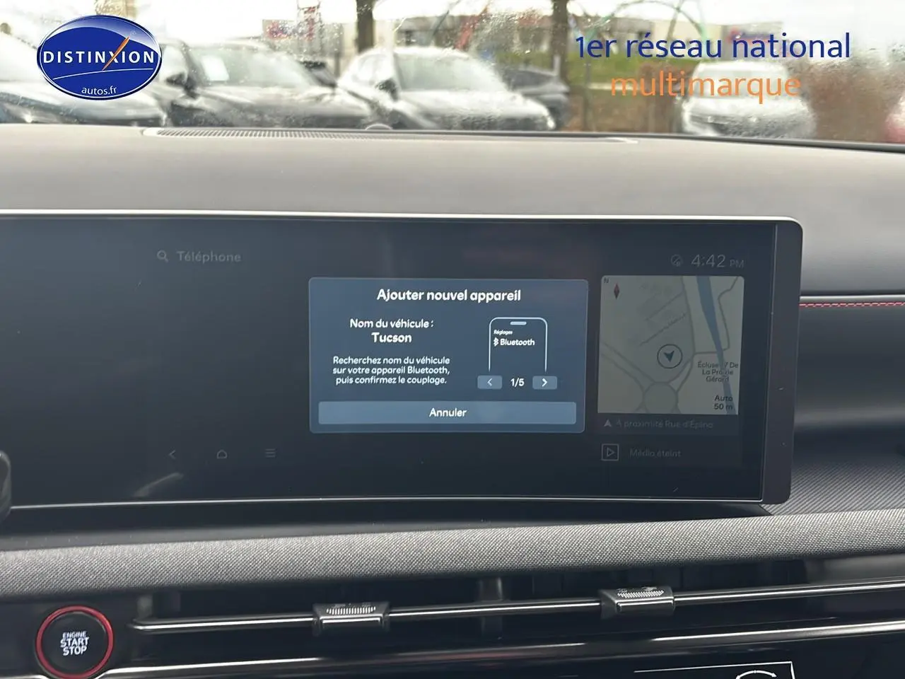 Écran tactile central du tableau de bord du Hyundai Tucson 2026 avec interface Bluetooth et navigation visible.