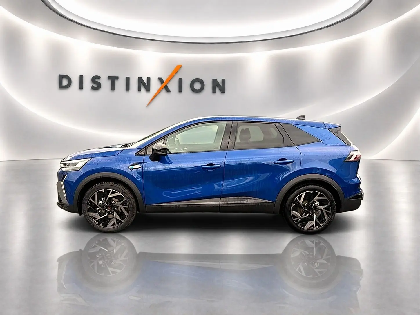 Profil droit du Renault Symbioz 2026 bleu iron avec jantes alu noires et détails noirs contrastants.