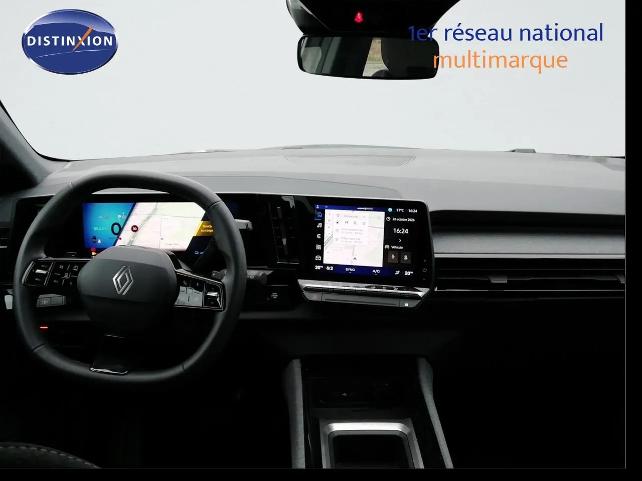 Vue intérieure frontale du tableau de bord du Renault Austral gris schiste avec écran tactile et volant multifonction.