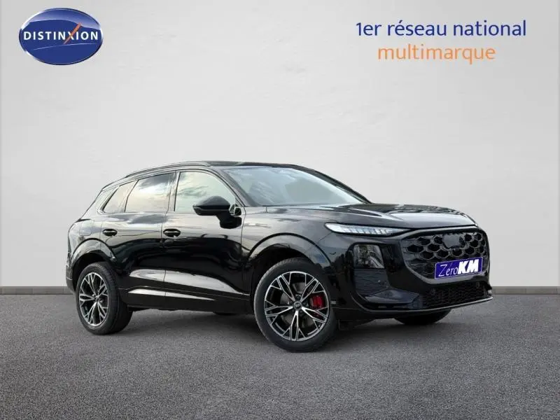 Audi Q3 2.0 TDI S line noir métallisé, vue 3/4 avant droit avec jantes alliage et étriers rouges.