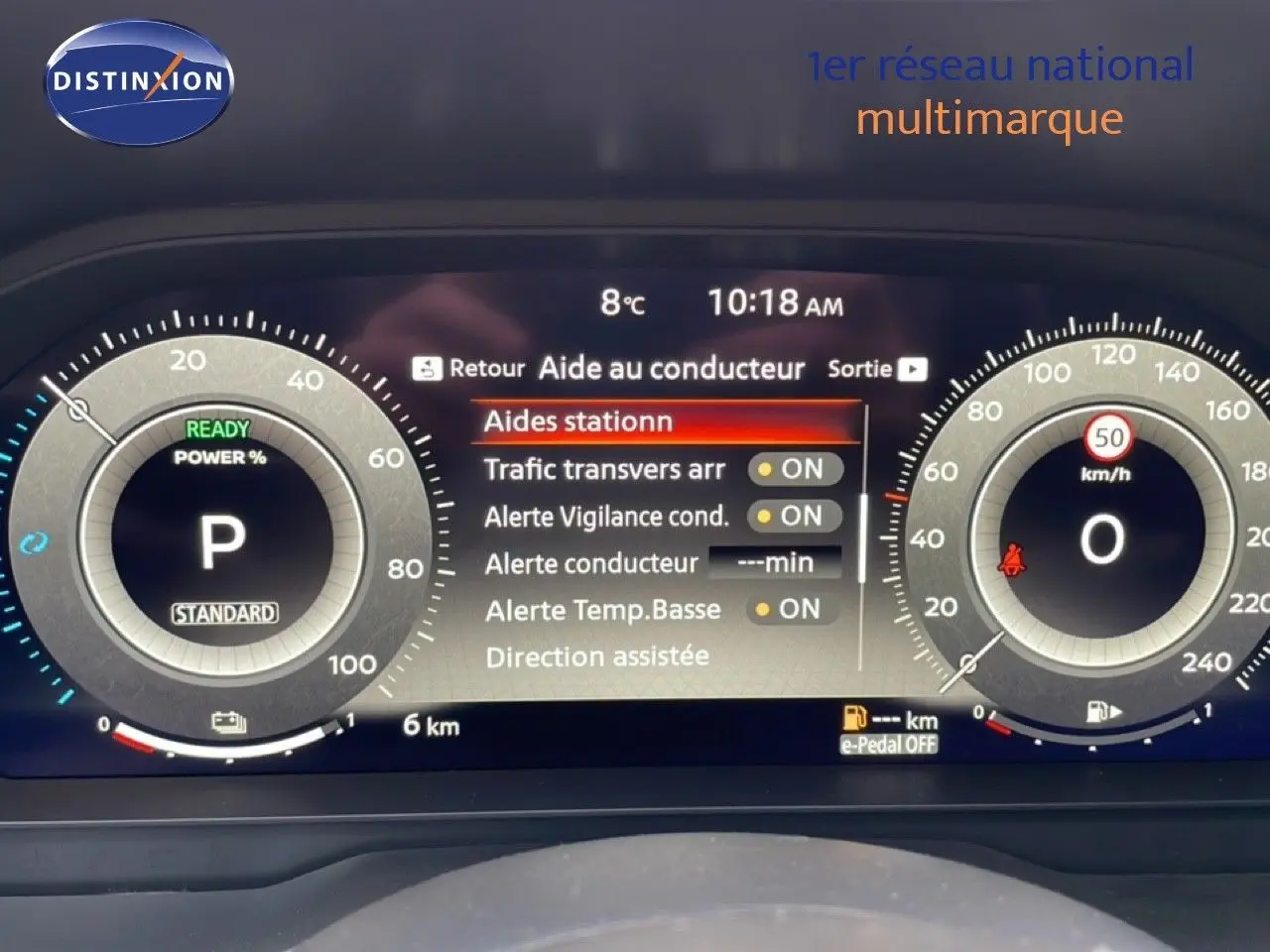 Tableau de bord numérique du Nissan Qashqai 2025, affichant les aides à la conduite et la vitesse à 0 km/h.