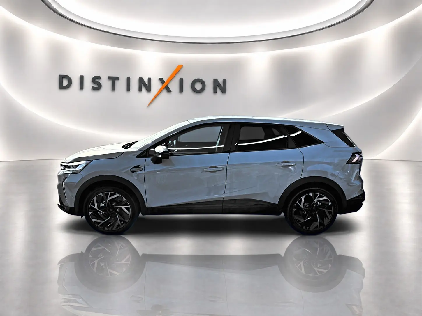 Profil droit du Renault Symbioz gris rafale 2026, SUV hybride avec jantes noires et toit noir contrasté.