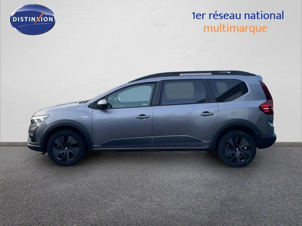 Vue de profil côté gauche d'un Dacia Jogger gris schiste métal, version 1.0 ECO-G 100CH Expression 2025.