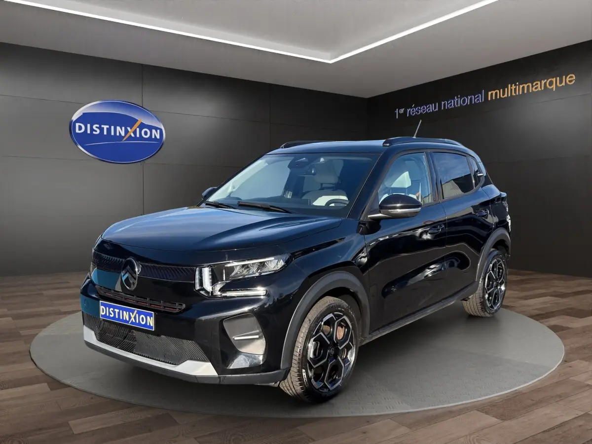 Citroën C3 Turbo 100 noir vue 3/4 avant droit, avec jantes noires et toit ouvrant panoramique.
