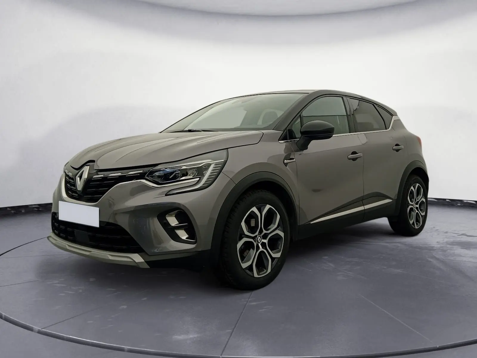 Renault Captur 1.3 Mild Hybrid 140 Techno gris Cassiopée/noir, vue 3/4 avant droit, jantes alliage 18 pouces distinctives.